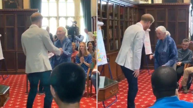 El príncipe Harry realiza el saludo del Chimpancé junto a Jane Goodall