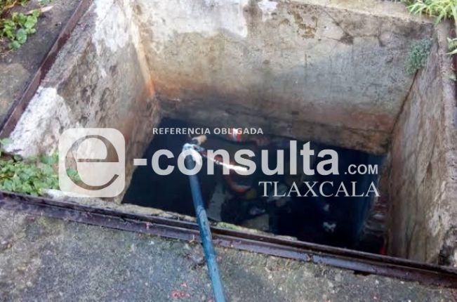 Localizan a mujer muerta dentro de una cisterna en Tenancingo 