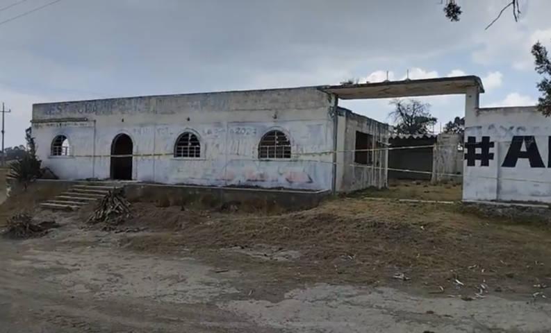 Localizan restos humanos en una cisterna de Tecopilco 