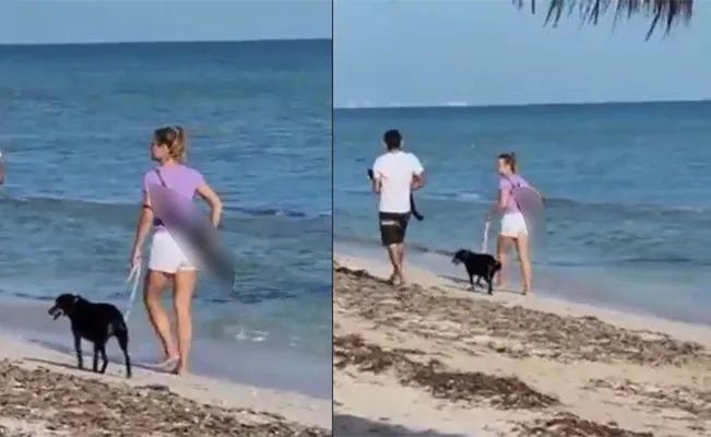 En  playas de Yucatán, captan a turista  extranjera pasearse con un rifle